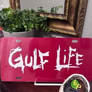 Gulf Life Red License Plate and BP Gulf Oil Spill Oyster Art